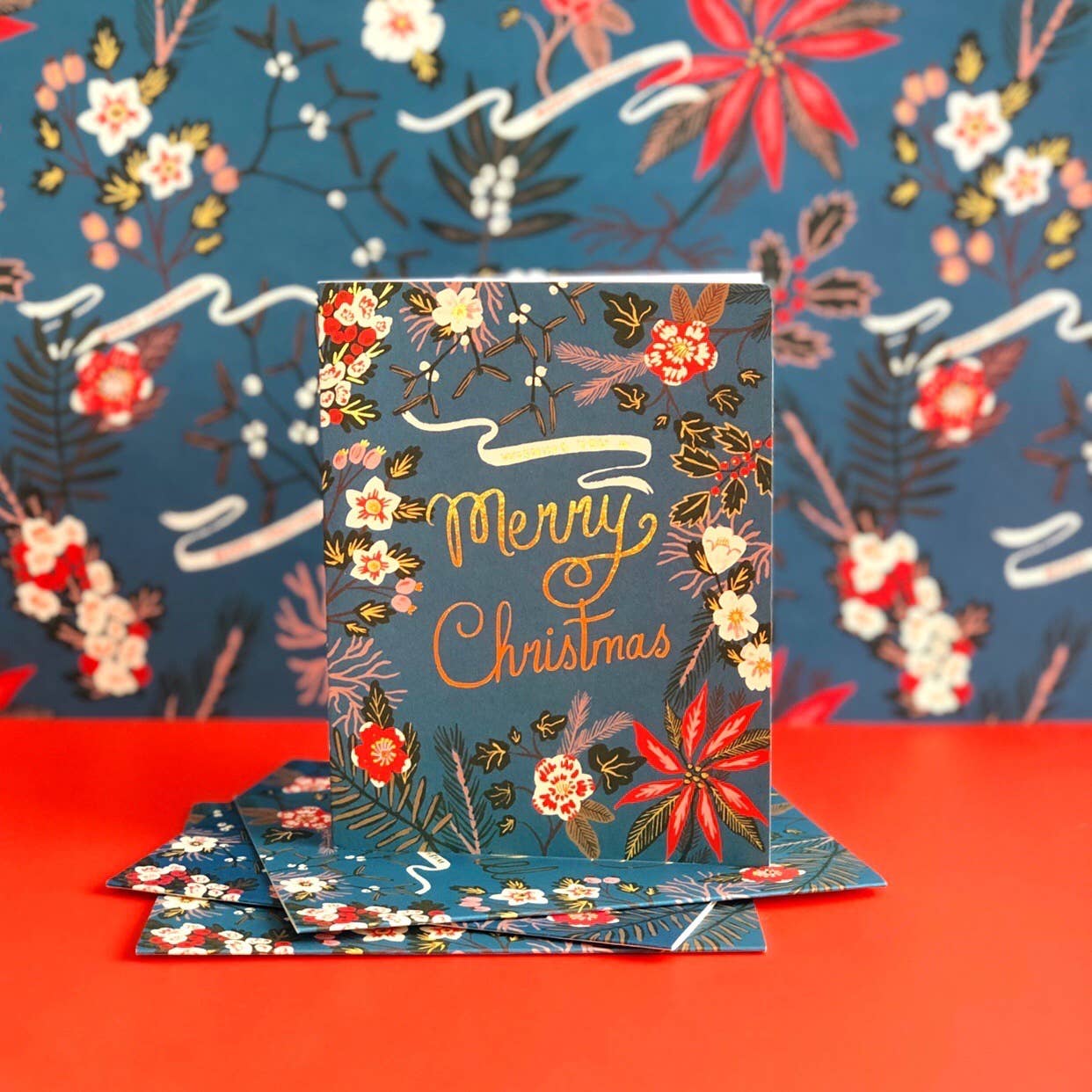 Blue Poinsettia holiday wrapping paper: Rolls of 3 sheets